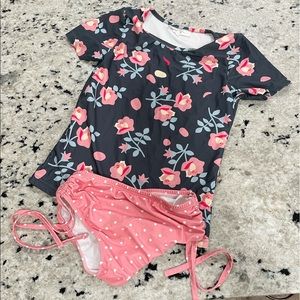 Oopsie Daisy Two Piece swim wear. Rash guard.
